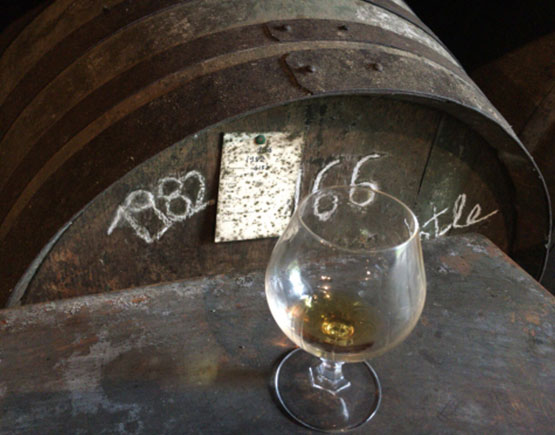 Armagnac-Domaine-de-Jouanda-barrels-and-glass