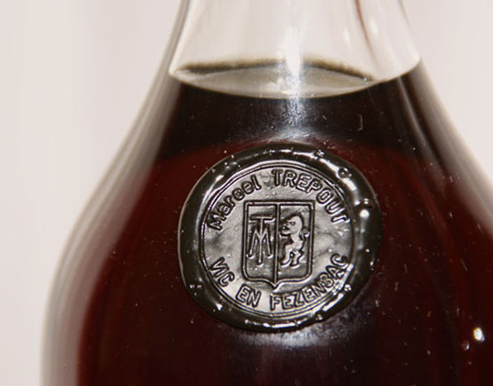 Armagnac-Marcel-Trepout-bottle-logo
