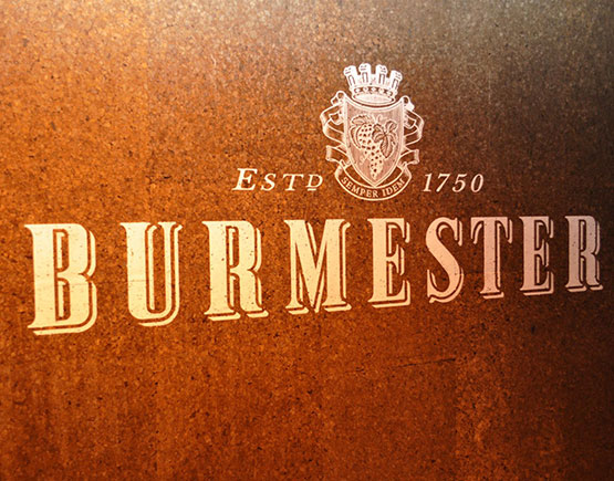 logo burmester on wall